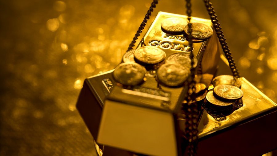 تراجع عقود الذهب الأصفر متغاضياً عن انخفاض العملة الأمريكية